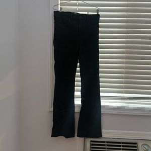 Hudson black coated flare jeans.